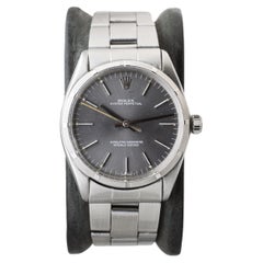 Rolex Edelstahl Oyster Perpetual mit bearbeiteter Lünette Rare Charcoal Zifferblatt 1960er Jahre