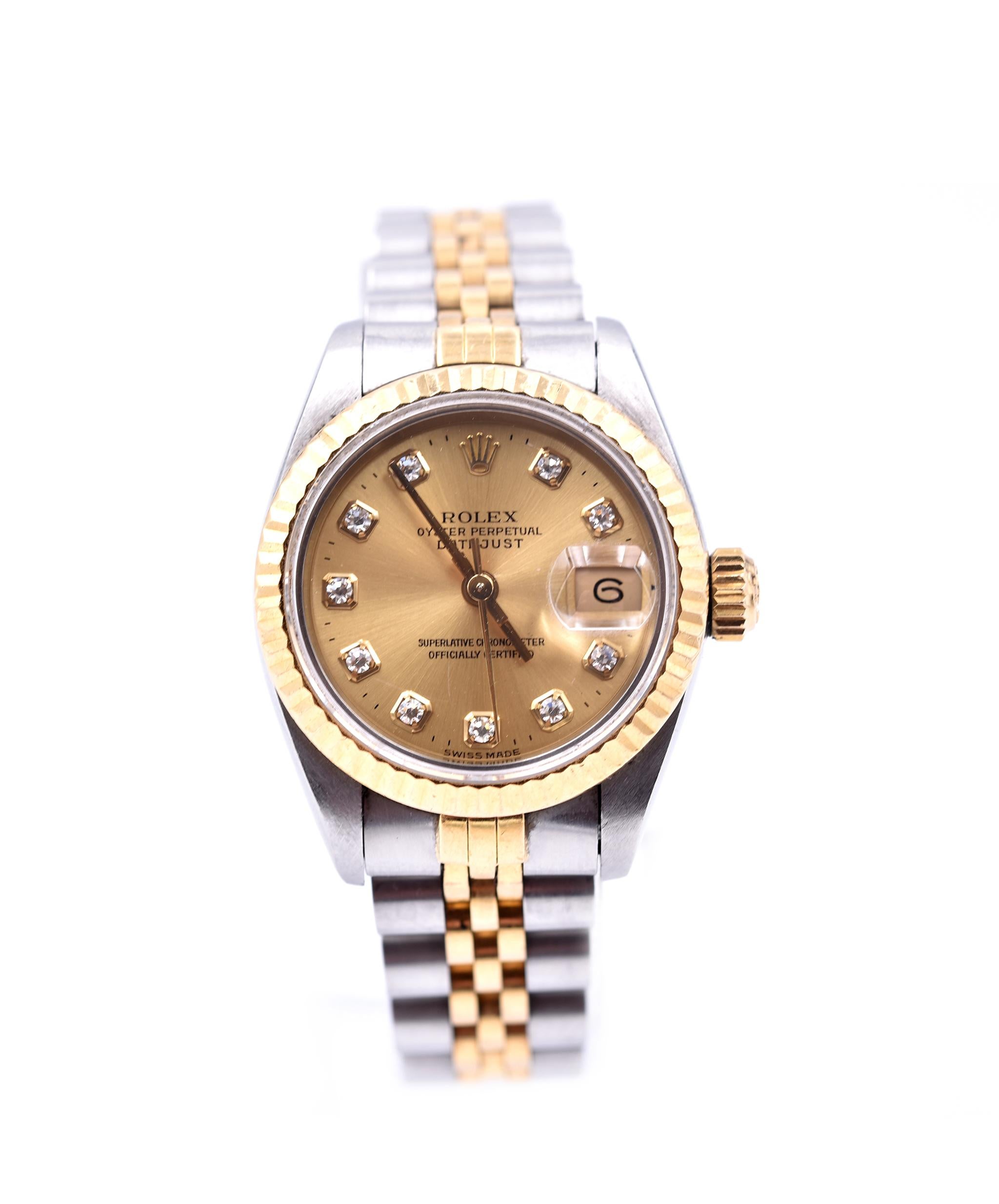 Movement: automatic
Function: hours, minutes, sweep seconds, date at 3 o’clock 
Case: 26mm steel case, sapphire crystal, 18k yellow gold fluted bezel
Band: steel/18k yellow gold jubilee bracelet and fold-over clasp
Dial: champagne diamond dial, gold