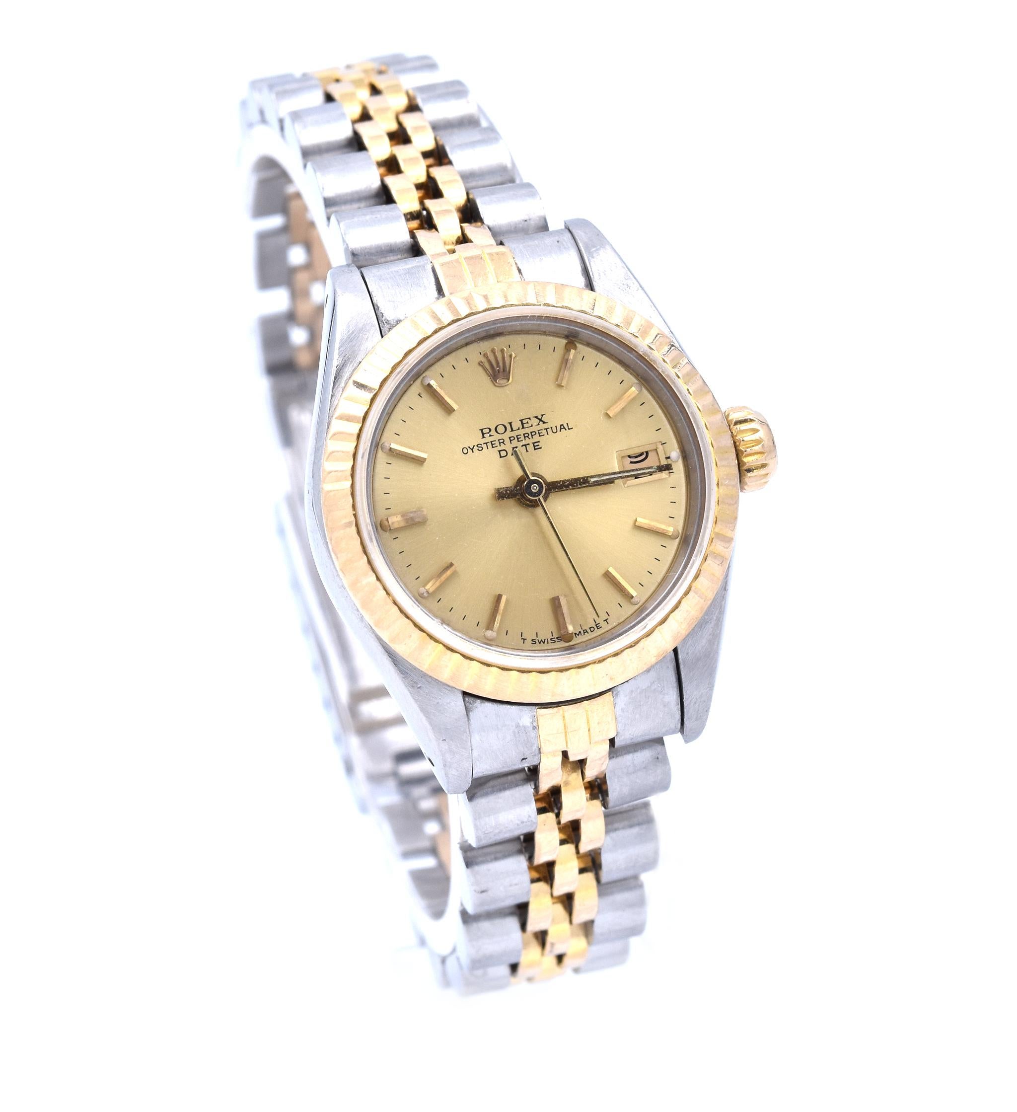 Movement: automatic
Function: hours, minutes, seconds, date at 3 o’clock 
Case: 26mm steel case, 18k yellow gold fluted bezel, sapphire crystal
Band: steel/18k yellow gold jubilee bracelet with folding clasp
Dial: champagne stick dial, yellow gold