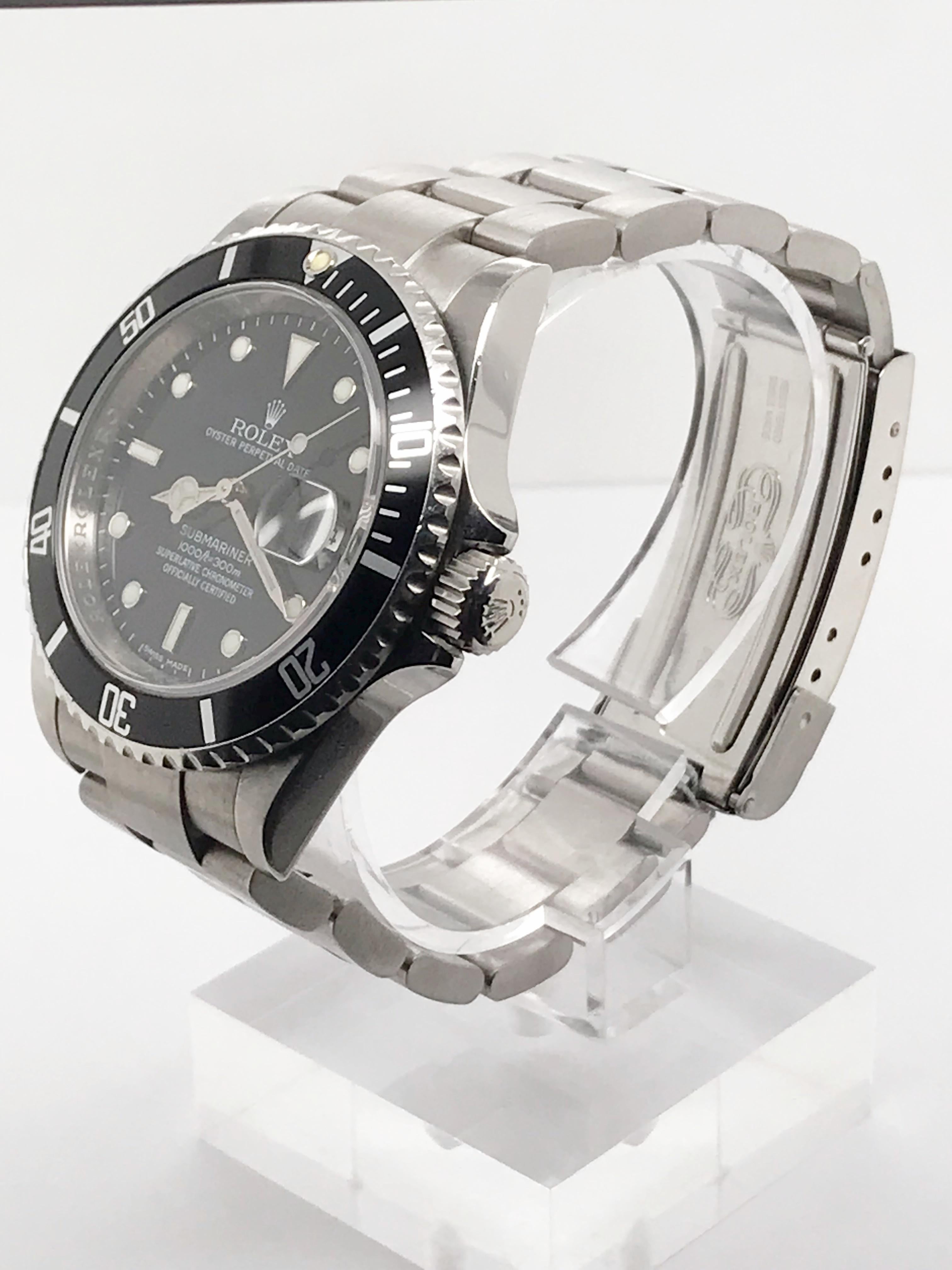 This mint condition Rolex Submariner is the classic athletic Rolex instantly recognizable and known for its superb quality. This watch features an engraved interior bezel and 