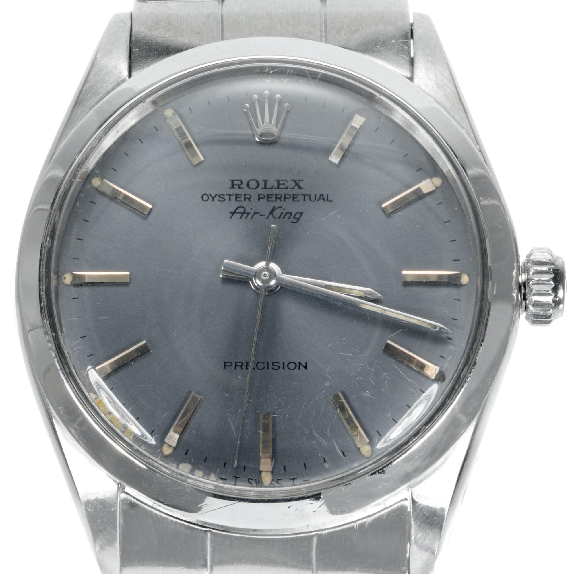 Men's 34mm Rolex air king 5500. Stainless steel case and oyster band. Circa 1966. 7.75 inches

Length: 39.80mm
Width: 34mm
Band width at case: 19mm
Case thickness: 11.30mm
Band: riveted oyster stainless steel band
Crystal: acrylic
Dial: gray with