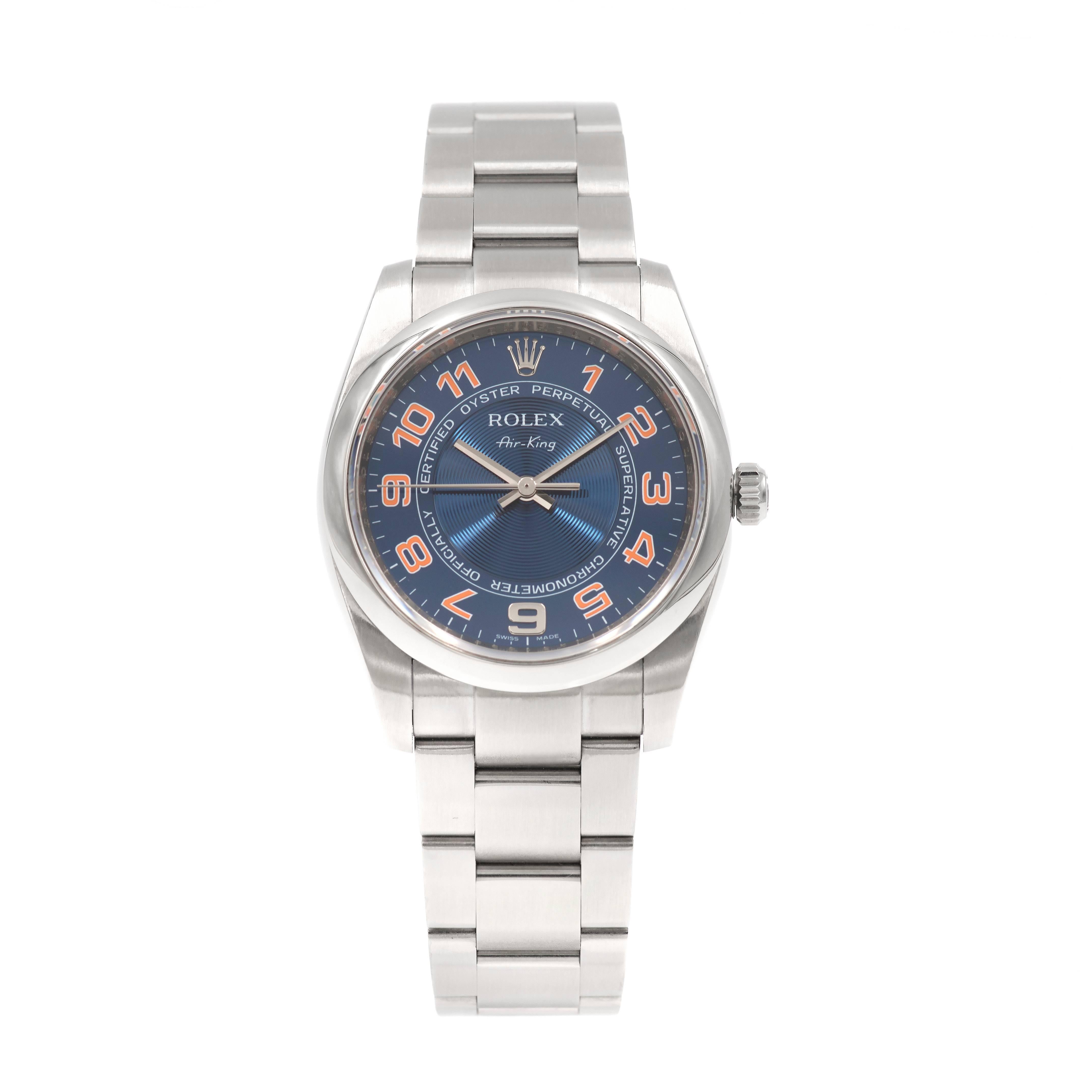 Rolex stainless steel Air King model 114200 with plain bezel and factory original blue dial with orange numbers and Oyster band. Circa 2008.

Stainless steel
Serial# M231692 – Style – 114200
111.8 grams
Band length: 8 1/8 inches – can be shortened