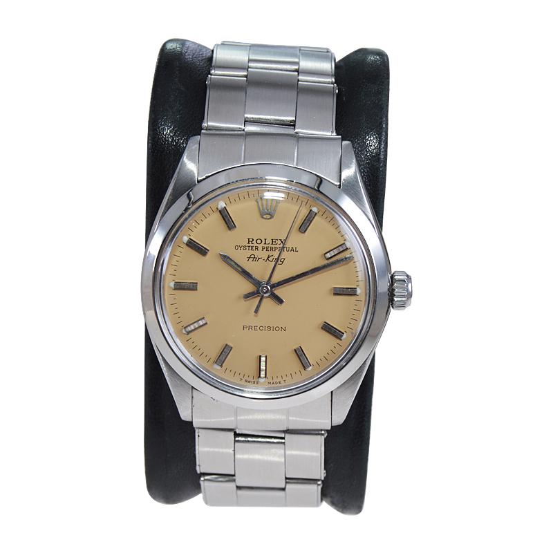 FACTORY / HOUSE: Rolex Watch Company
STYLE / REFERENCE: Air King / Reference 5500 / 1002
METAL / MATERIAL: Stainless Steel
CIRCA / YEAR: Late 1960's
DIMENSIONS / SIZE: Length 38mm x Diameter 34mm
MOVEMENT / CALIBER: Perpetual Winding / 26 Jewels /