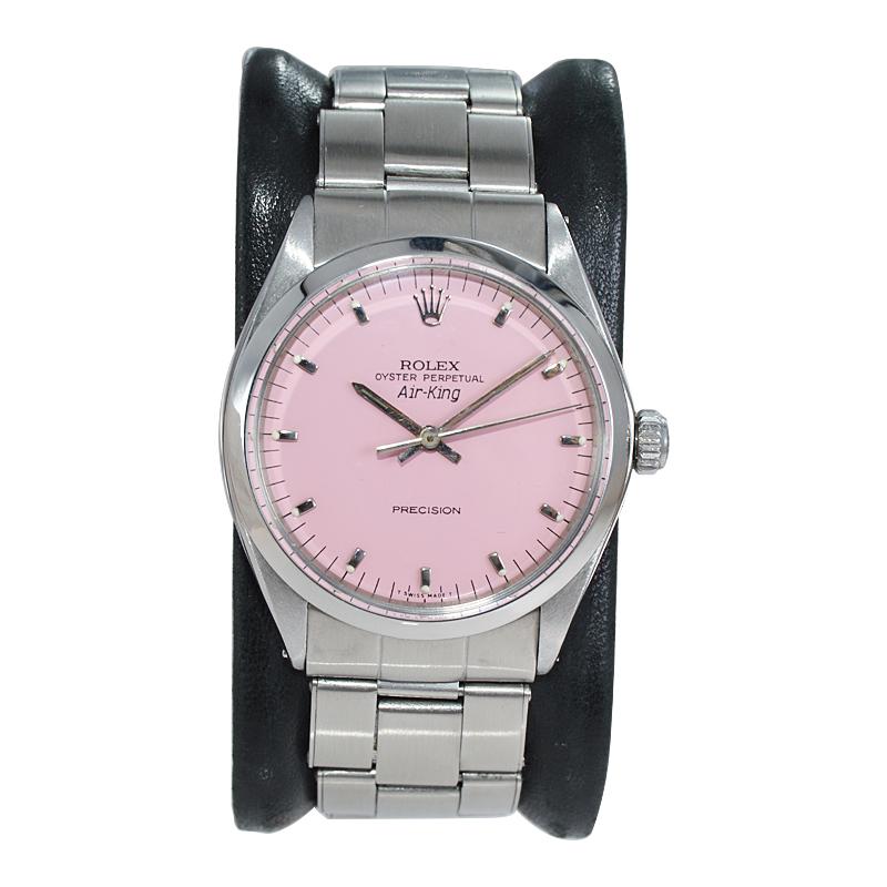 FACTORY / HOUSE: Rolex Watch Company
STYLE / REFERENCE: Air King / Reference 5500 / 1002
METAL / MATERIAL: Stainless Steel
CIRCA / YEAR: Early 1970's
DIMENSIONS / SIZE: Length 38mm x Diameter 34mm
MOVEMENT / CALIBER: Perpetual Winding / 26 Jewels /