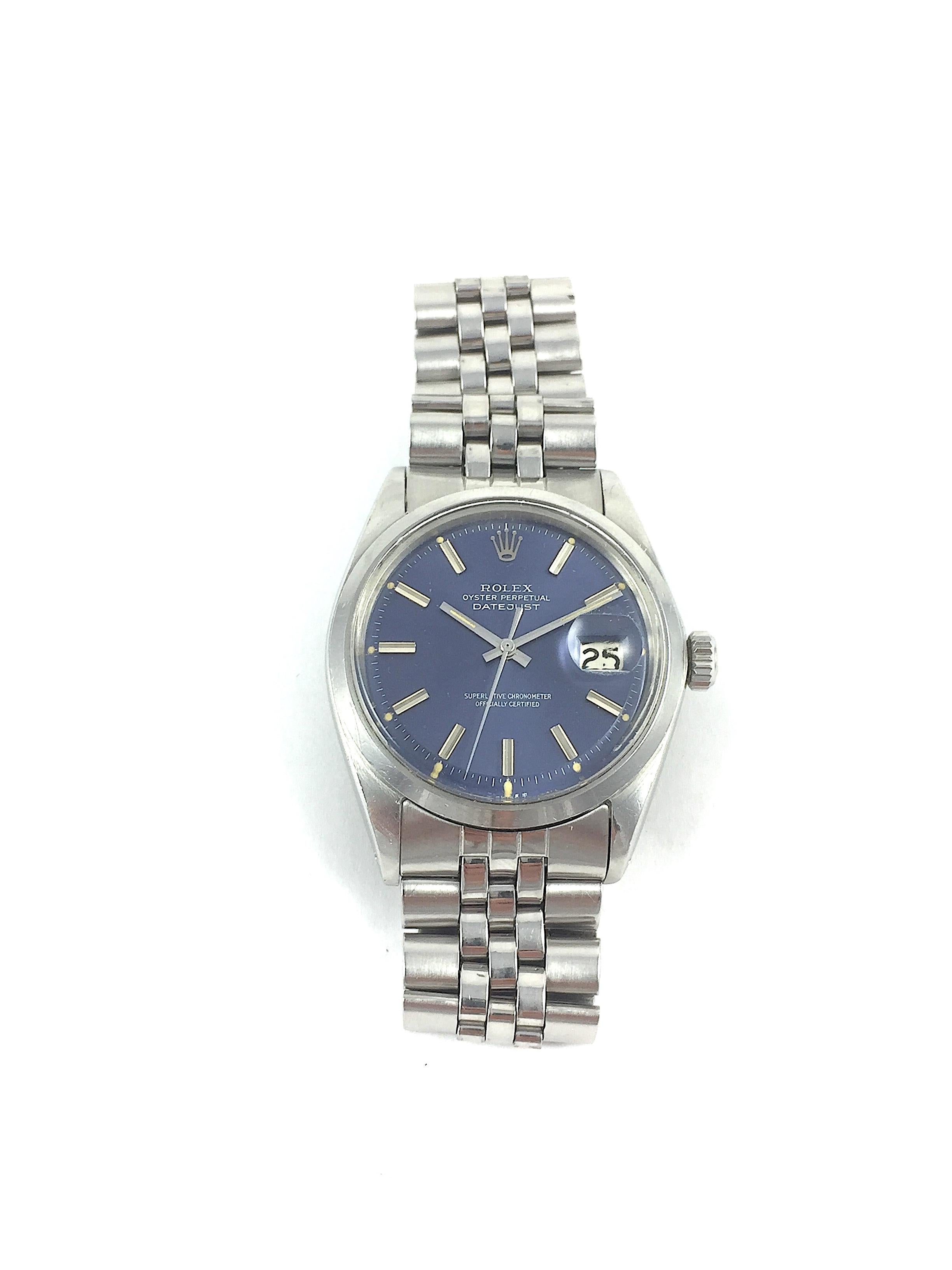 Rolex Stainless Steel Oyster Perpetual Datejust Watch
Rare Factory Blue Wide Index Gloss Dial
Smooth Stainless Steel Bezel
Stainless Steel Case
Dial Shows Some Wear and light Markings 
36mm in size 
Features Rolex Automatic Movement with Calibre