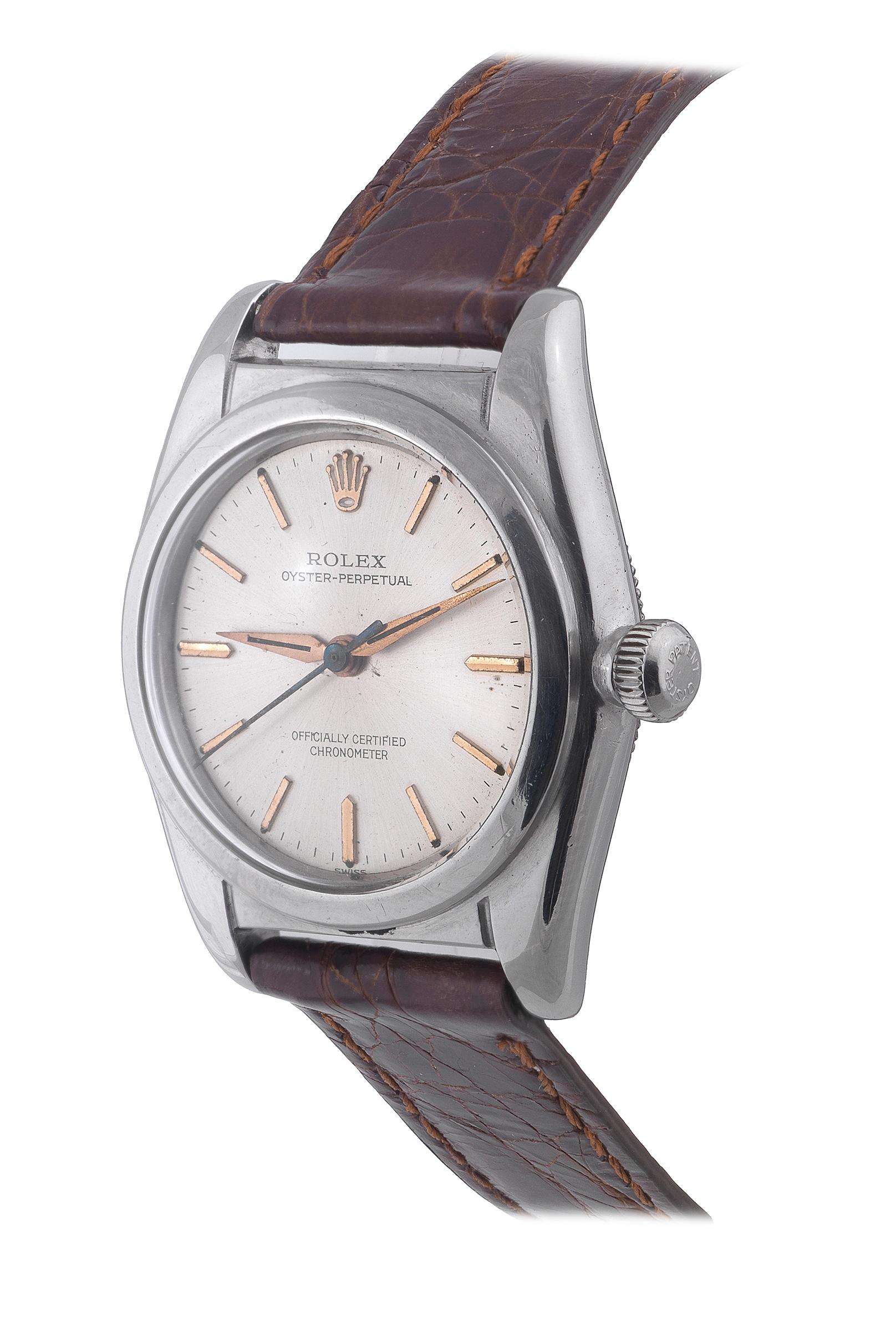 BERNARDO ANTICHITÀ PONTE VECCHIO FLORENCE 

Made in the 1940s. Fine, tonneau-shaped, center seconds, self-winding, waterresistant, stainless steel wristwatch.
Case two-body, polished and brushed, screwed-down case back and crown, polished inclined