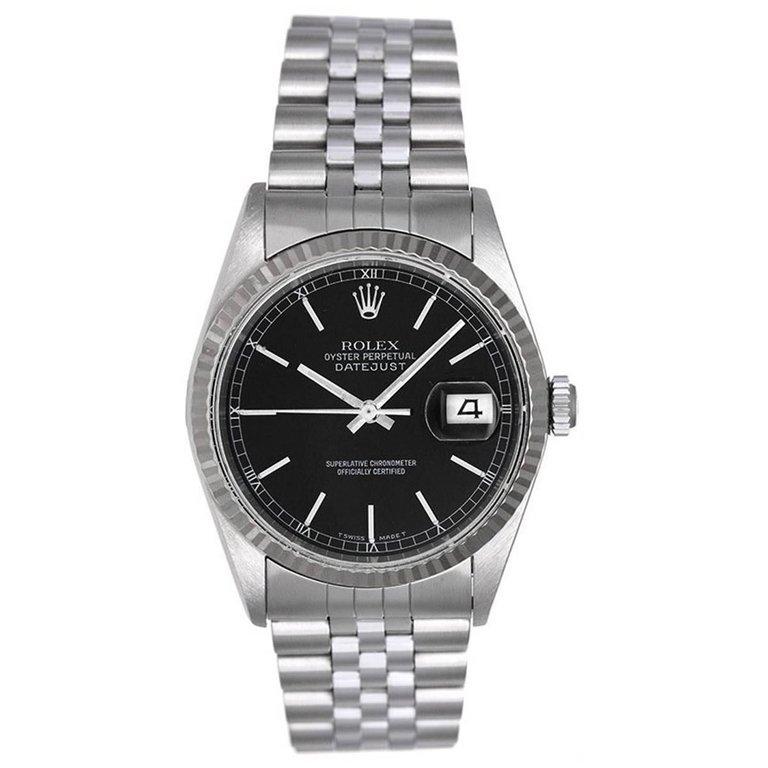 Rolex Datejust Men's Stainless Steel Watch 16234 -  Automatic winding, 31 jewels, Quickset, sapphire crystal. Stainless steel case with 18k white gold fluted bezel  (36mm diameter). Black dial with stick markers. Stainless steel Jubilee bracelet.