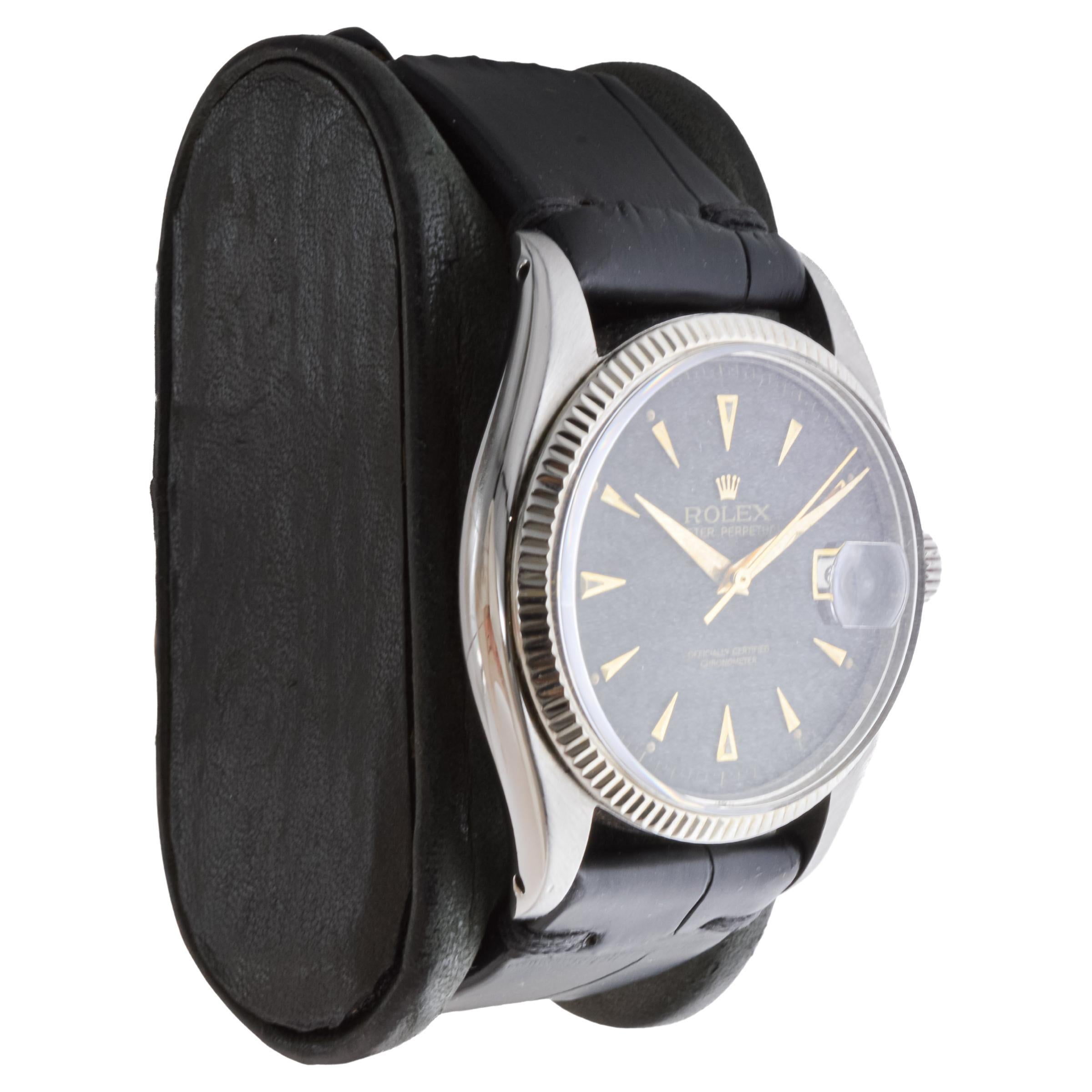 FACTORY / HOUSE: Rolex Watch Company
STYLE / REFERENCE: Oyster Perpetual Datejust / Reference 6305
METAL / MATERIAL: Stainless Steel / 14Kt. Solid White Gold Bezel 
CIRCA / YEAR: 1953 / 54
DIMENSIONS / SIZE: Length 44mm x Diameter 36mm
MOVEMENT /