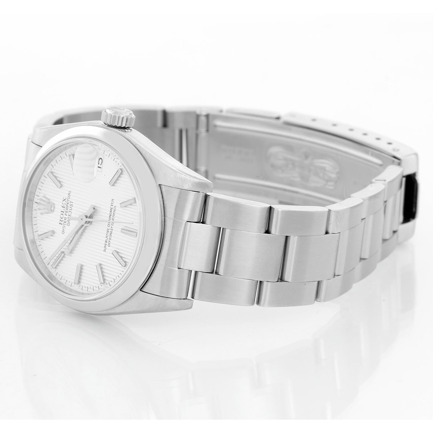 Rolex Stainless Steel Datejust Midsize Watch 78240 - Automatic winding. Stainless steel case (31mm) with smooth bezel. Silver tapestry dial . Stainless steel Oyster bracelet. Pre-owned with custom box .