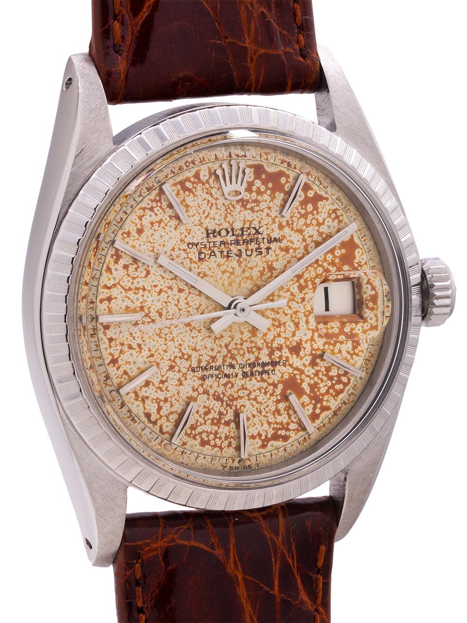 Rolex Stainless Steel Datejust ref 1603 serial # 1.9 million circa 1968. Full size man’s 36mm diameter case with engine turned bezel and acrylic crystal with a richly patina’d silvered satin dial with colorful rust color “freckles.” The original