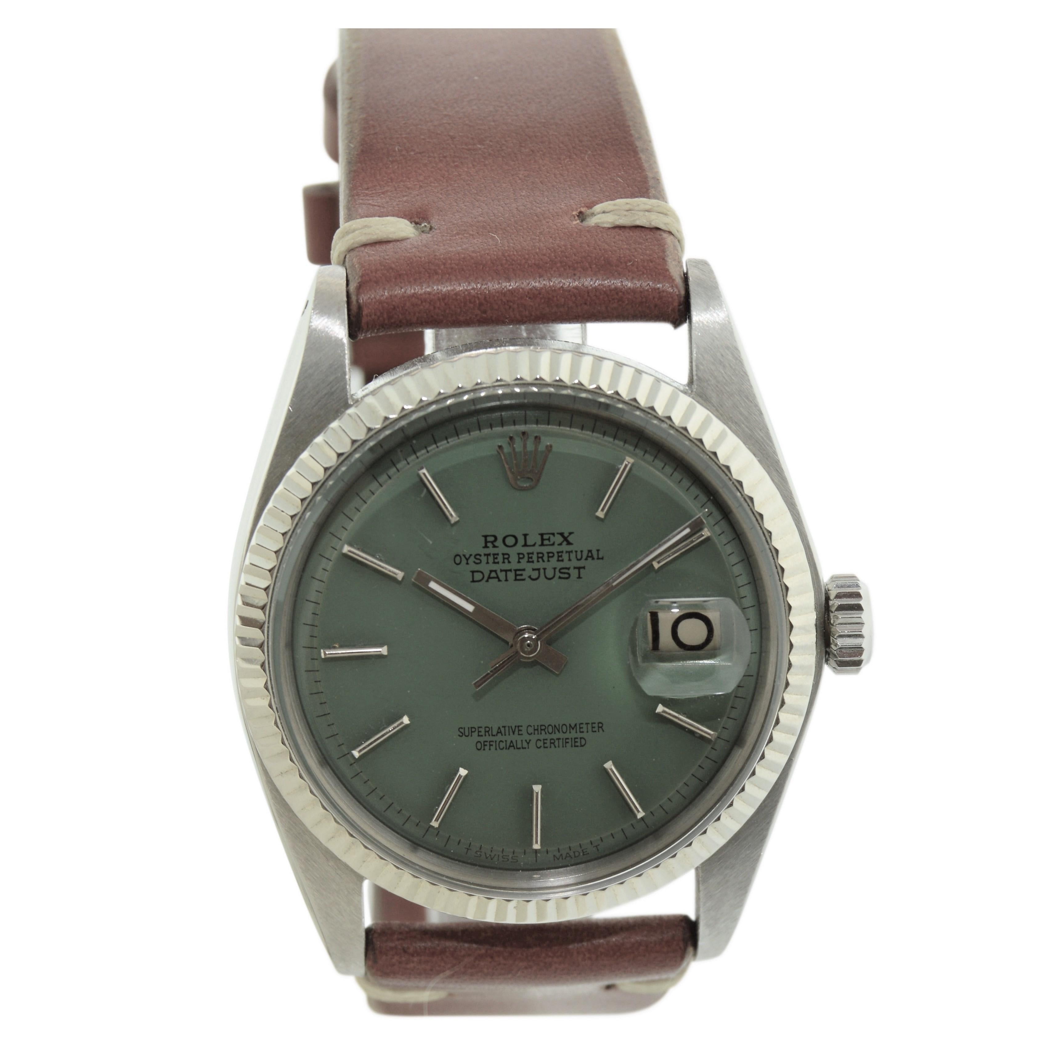 FACTORY / HOUSE: Rolex Watch Company
STYLE / REFERENCE: Datejust / Reference 1601
METAL / MATERIAL: Stainless Steel w/ White Gold Bezel
DIMENSIONS:  42mm X 36mm
CIRCA: 1960's
MOVEMENT / CALIBER: Perpetual Winding / 26 Jewels / Caliber 1570
DIAL /