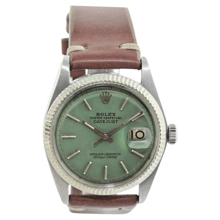 FACTORY / HOUSE: Rolex Watch Company
STYLE / REFERENCE: Datejust / Reference 1601
METAL / MATERIAL: Stainless Steel with White Gold Bezel
CIRCA / YEAR: 1960's
DIMENSIONS / SIZE: Length  42mm X Diameter 36mm
MOVEMENT / CALIBER: Perpetual Winding / 26