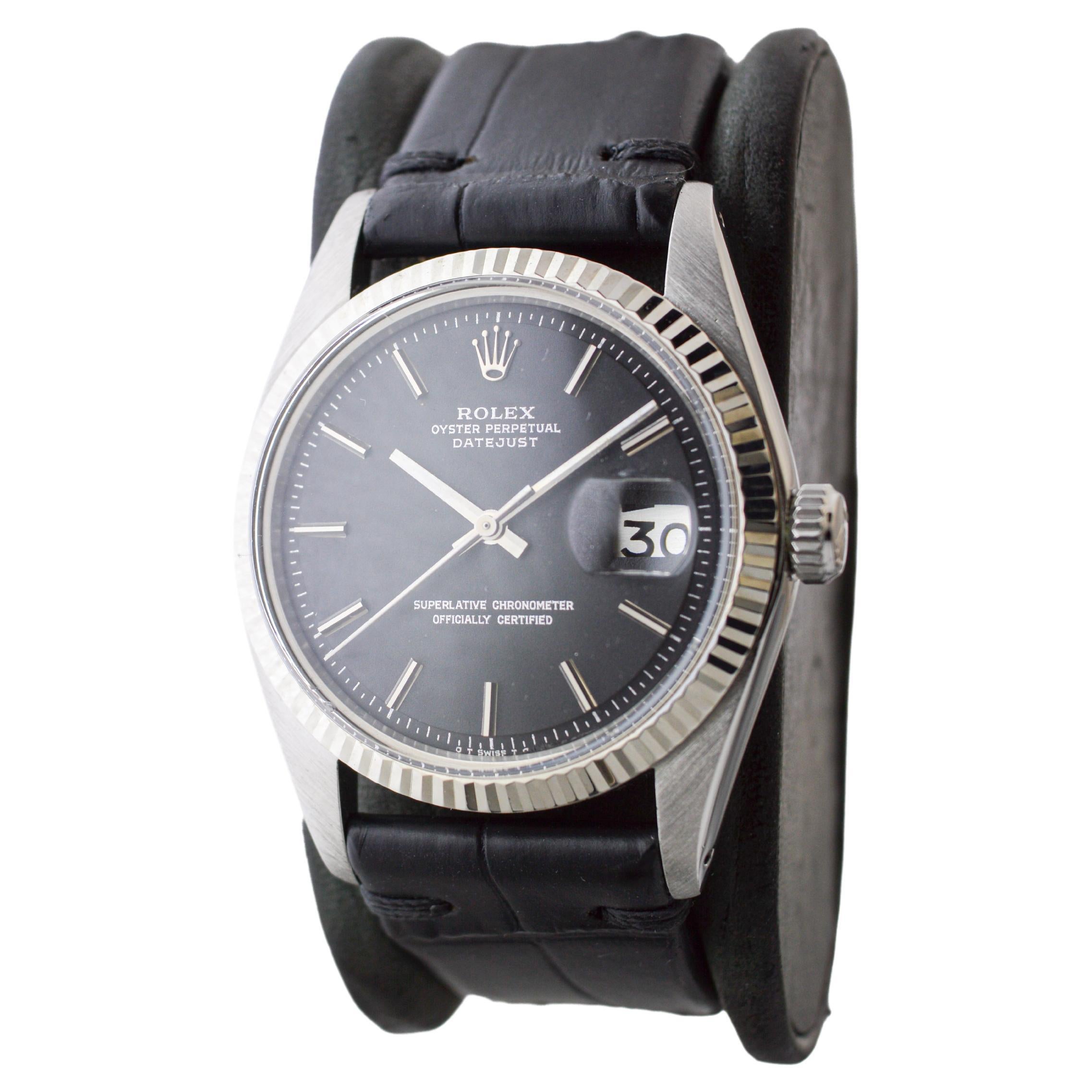 Women's or Men's Rolex Stainless Steel Datejust with Factory Original Black Dial circa 1970's