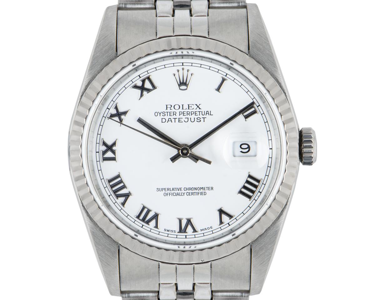 A 36 mm Datejust in stainless steel by Rolex. Features a white Roman dial and an iconic fluted white gold bezel. The Jubilee bracelet comes with an Oyster deployant clasp. Fitted with sapphire crystal and a self-winding automatic movement.

In