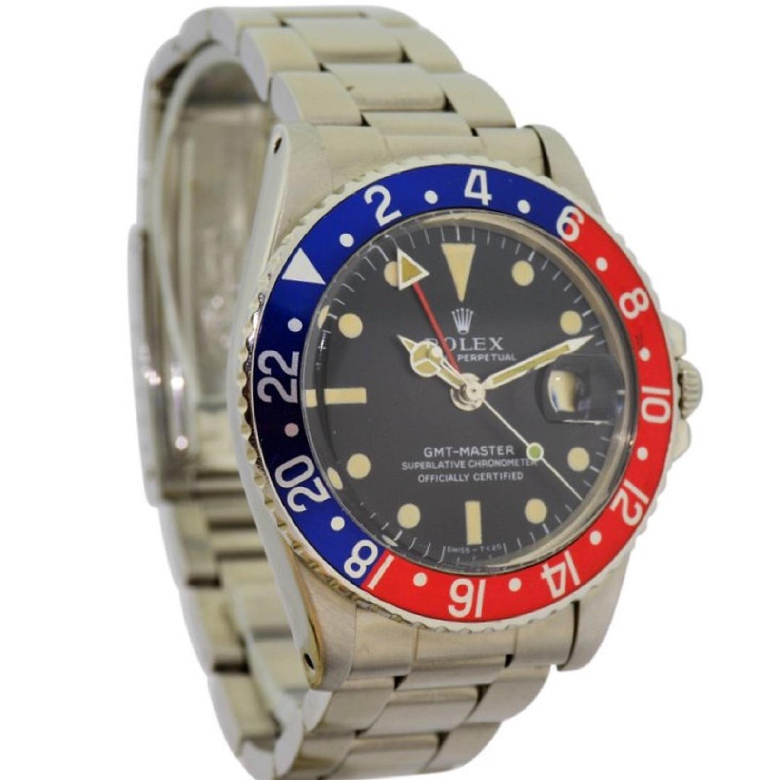 FACTORY / HOUSE: Rolex Watch Company
STYLE / REFERENCE: GMT / Ref. 1675 
METAL / MATERIAL: Stainless Steel 
DIMENSIONS:  47mm  X  39mm
CIRCA: 1968
MOVEMENT / CALIBER: 26 Jewels / Perpetual Winding / Cal. 1570
DIAL / HANDS: Original Black / Hands,