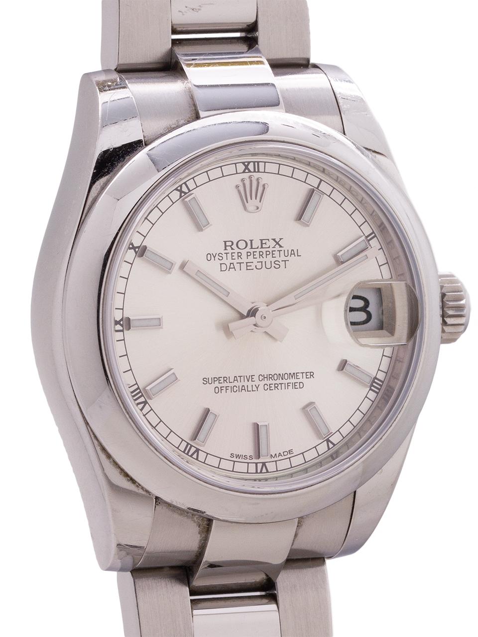 Man/s midsize Rolex stainless steel Datejust ref# 178240 circa 2015 complete with box and papers. Featuring  31mm diameter midsize case with smooth domed bezel and sapphire crystal, original silvered dial with new style wide luminous stick indexes.