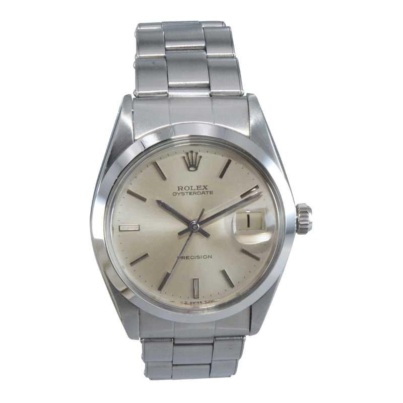 FACTORY / HOUSE: Rolex Watch Company
STYLE / REFERENCE: Oyster Date / 6694
METAL / MATERIAL: Stainless Steel
CIRCA / YEAR: 1966 / 69
DIMENSIONS / SIZE: 42mm x 34mm 
MOVEMENT / CALIBER: Manual Winding / 17 Jewels / Cal. 1225
DIAL / HANDS: Original