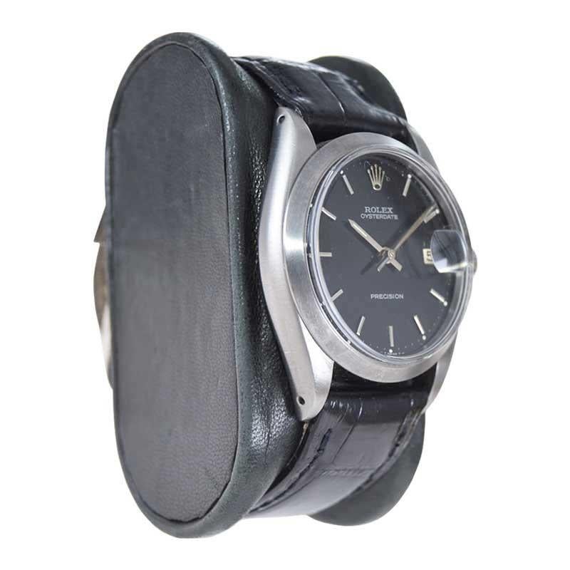 Rolex Montre Oyster Date en acier inoxydable avec cadran noir d'origine, années 1960 Excellent état à Long Beach, CA