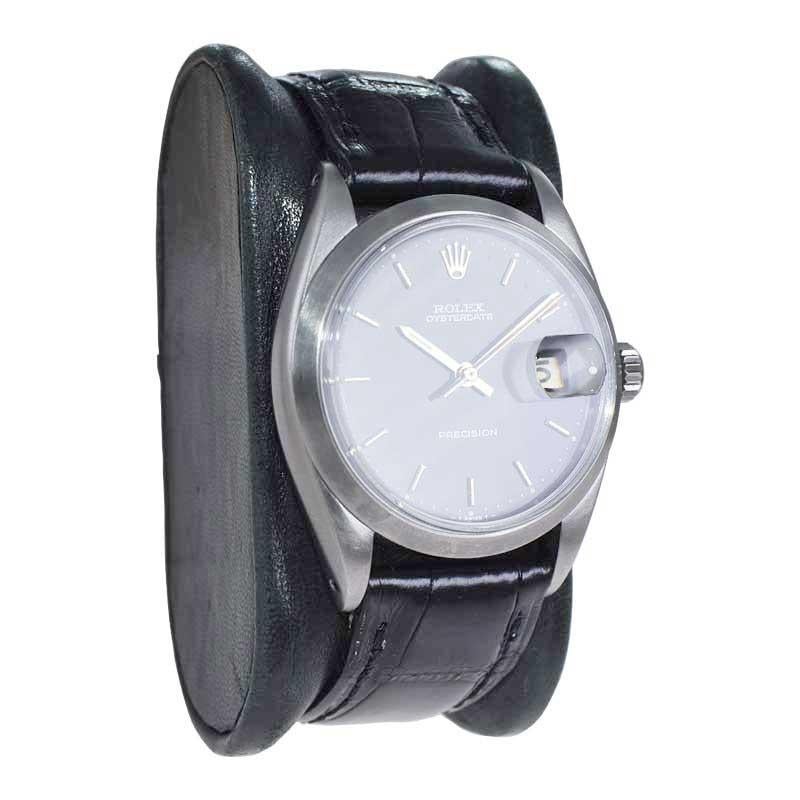  Rolex Montre Oyster Date en acier inoxydable avec cadran noir d'origine, années 1960 Unisexe 