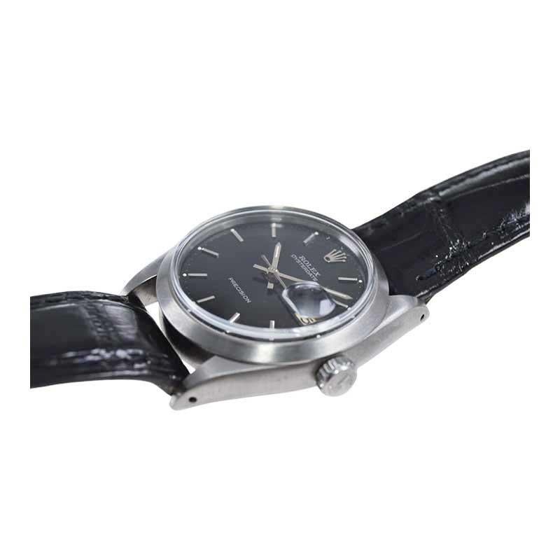 Rolex Montre Oyster Date en acier inoxydable avec cadran noir d'origine, années 1960 1