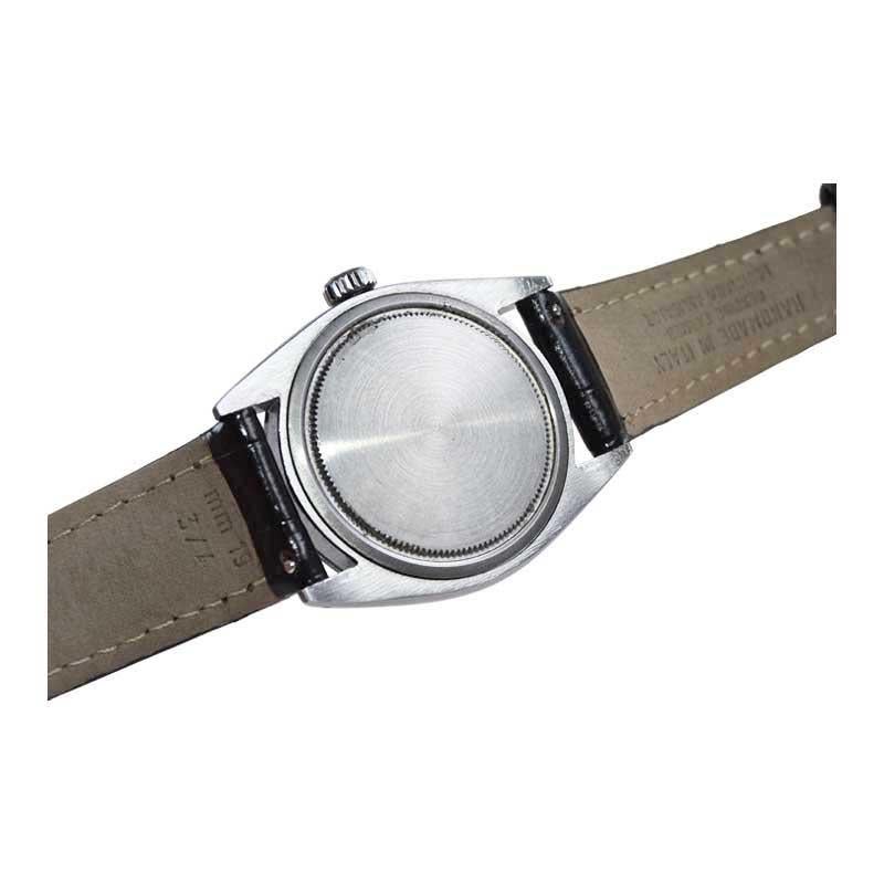 Rolex Montre Oyster Date en acier inoxydable avec cadran noir d'origine, années 1960 4