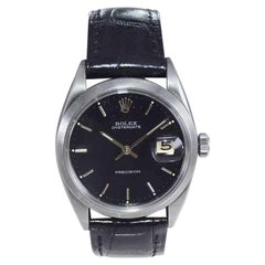 Rolex Montre Oyster Date en acier inoxydable avec cadran noir d'origine, années 1960