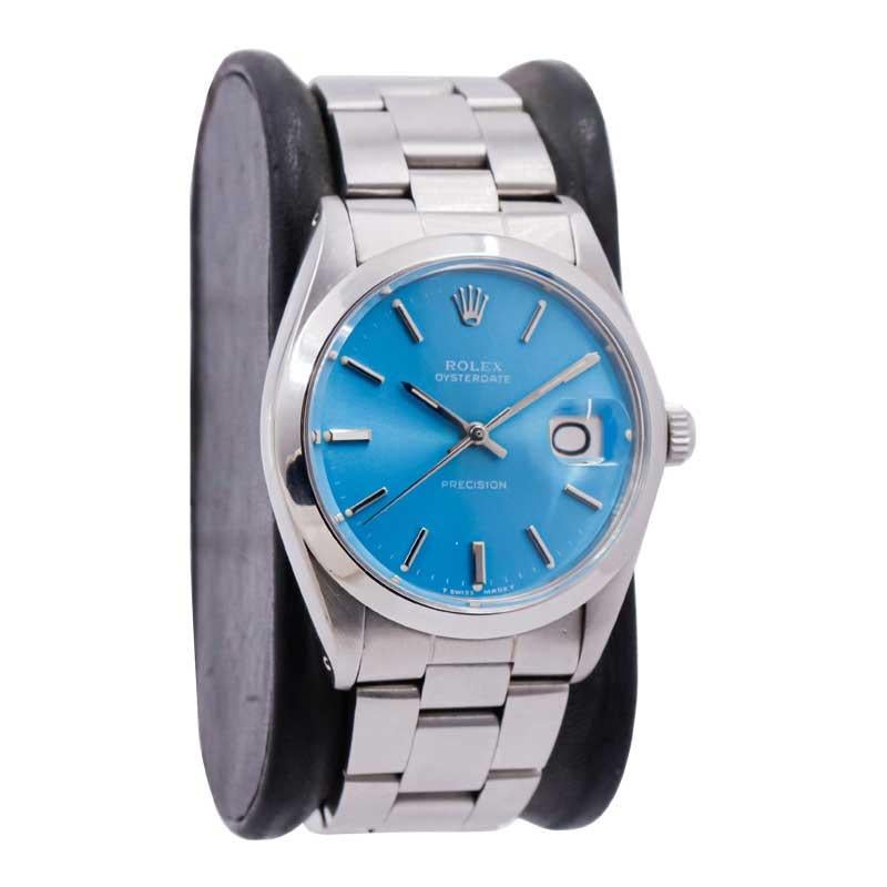 FACTORY / HOUSE: Rolex Watch Company
STYLE / REFERENCE: Oyster Date / Reference 6694
METAL / MATERIAL: Stainless Steel
CIRCA / YEAR: 1970's
DIMENSIONS / SIZE: 42 Length X 35 Diameter
MOVEMENT / CALIBER: Manual Winding / 17 Jewels / Caliber 
DIAL /