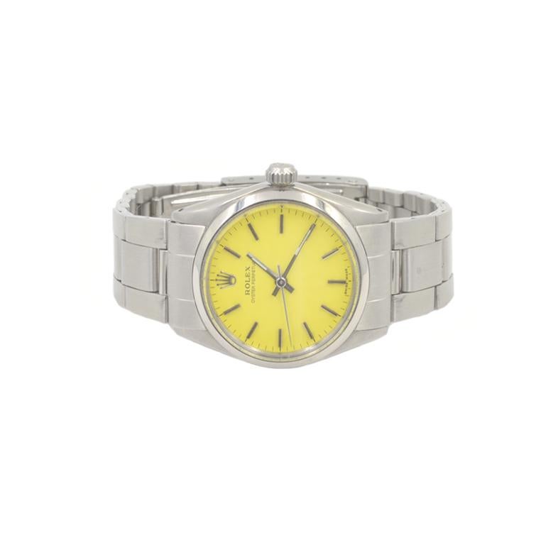 Rolex midsize 31mm, automatic movement watch, 378xxxx, circa 1973. 6748 reference, custom yellow dial. Stainless steel case and bracelet.

This watch includes a one year warranty from the time of purchase for accurate timekeeping.