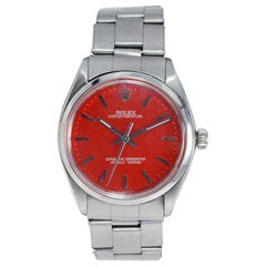 Rolex Montre Oyster Perpetual en acier inoxydable avec cadran rouge fini sur mesure, années 1960