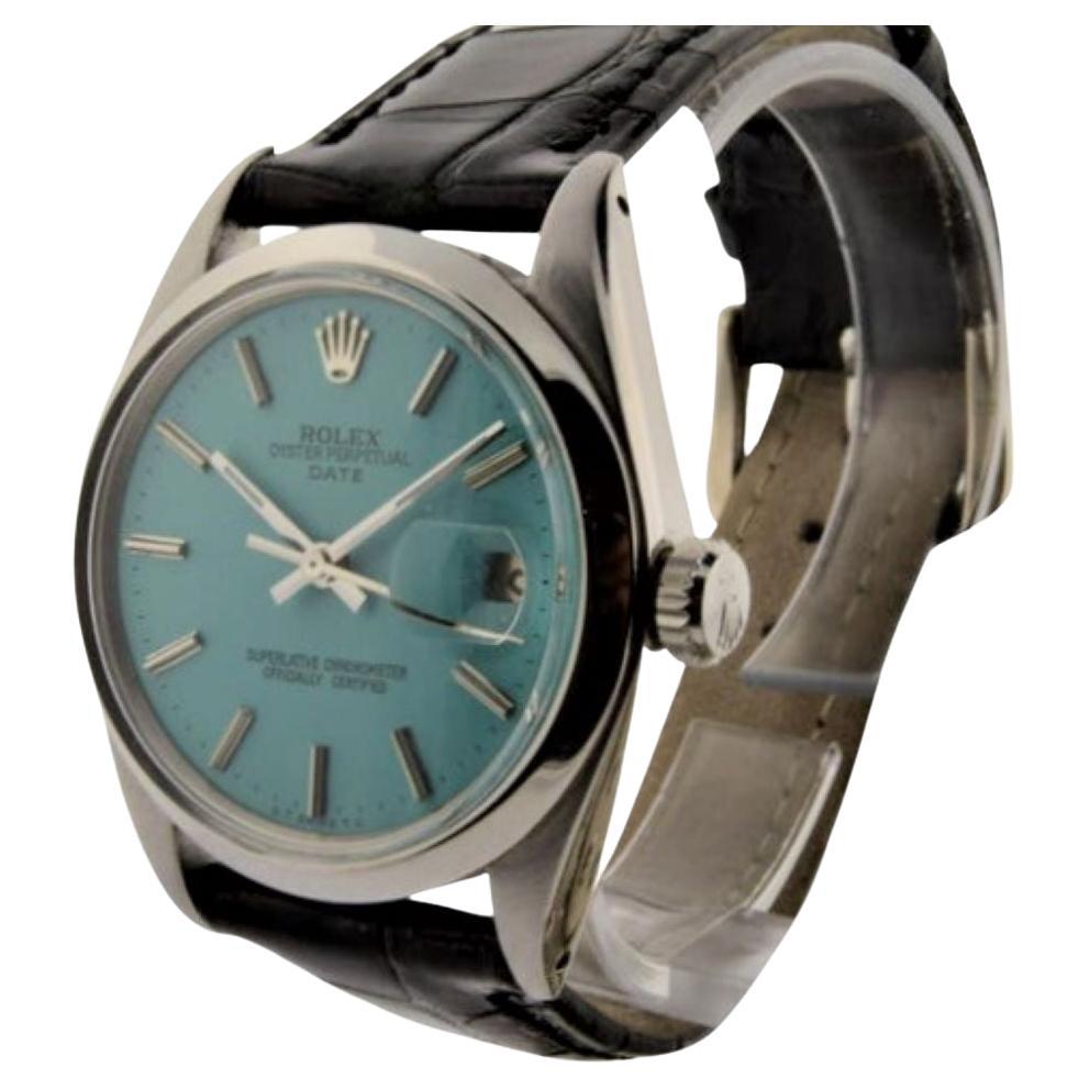 FACTORY / HOUSE:  Rolex Watch Company
STYLE / REFERENCE: Oyster Perpetual Date / Ref. 1500
METAL / MATERIAL: Stainless Steel
DIMENSIONS: 41mm  X  34mm
CIRCA: 1970's
MOVEMENT / CALIBER: 26 Jewels / Cal. 1570
DIAL / HANDS: Custom Turquoise Blue w/