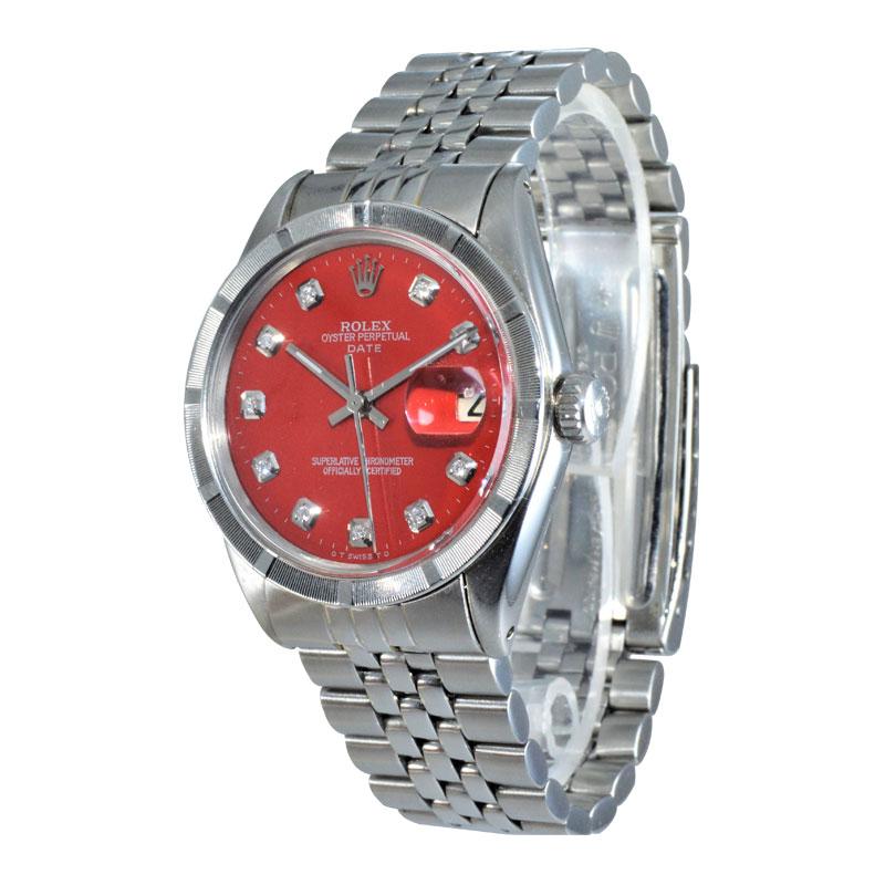 FACTORY / HOUSE: Rolex Watch Company
STYLE / REFERENCE: Oyster Perpetual / Date / Ref. 1500
METAL / MATERIAL: Stainless Steel
DIMENSIONS:  39mm  X  34mm
CIRCA: 1970's
MOVEMENT / CALIBER: Perpetual / 26 Jewels / Cal. 1570
DIAL / HANDS: Custom Red