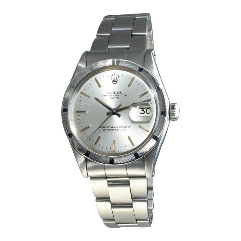 FACTORY / HOUSE: Rolex Watch Co.
STYLE / REFERENCE: Oyster Perpetual Date / Ref 1501
METAL / MATERIAL: Stainless Steel
CIRCA / YEAR: Early 1970's
DIMENSIONS / SIZE: 42mm x 34mm
MOVEMENT / CALIBER: Perpetual Winding / 26 Jewels 
DIAL / HANDS: