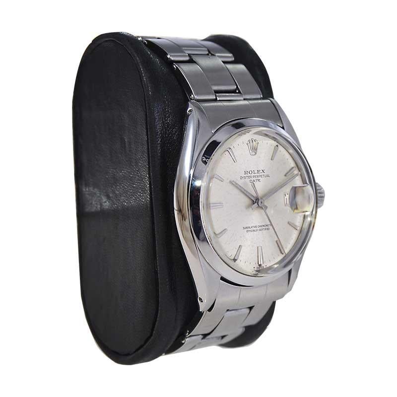 FACTORY / HOUSE: Rolex Watch Company
STYLE / REFERENCE: Oyster Perpetual Date / Reference 1500
METAL / MATERIAL: Stainless Steel
CIRCA / YEAR: Mid 1960's
DIMENSIONS / SIZE: Length 42mm X Diameter 35mm
MOVEMENT / CALIBER: Perpetual Winding / 26