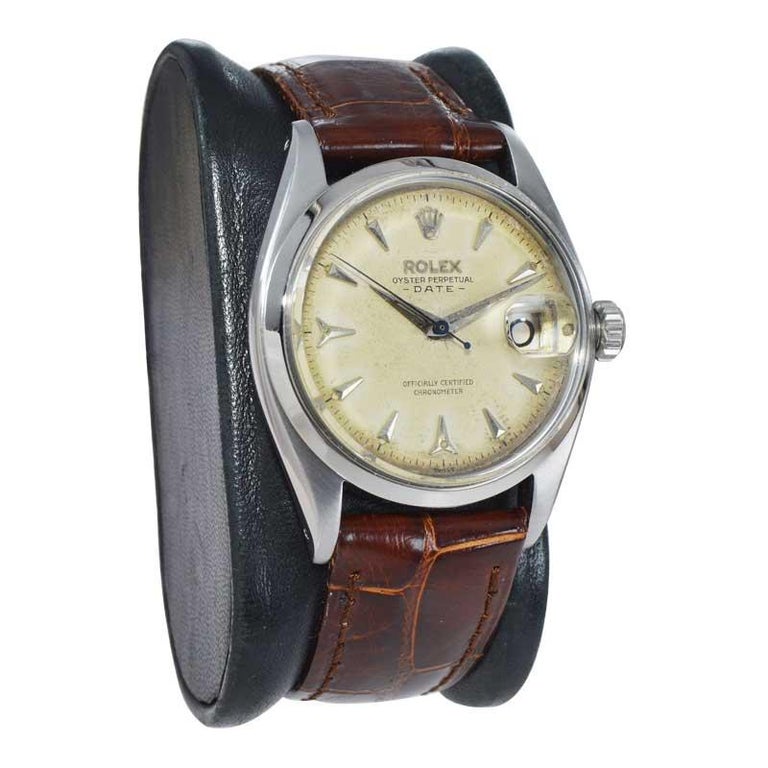 Rolex Stainless Steel Oyster Perpetual Patinated Dial Manual Watch, 1957  For Sale at 1stDibs