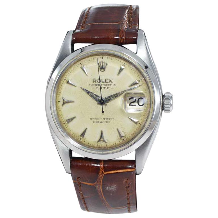 Rolex Stainless Steel Oyster Perpetual Patinated Dial Manual Watch, 1957  For Sale at 1stDibs