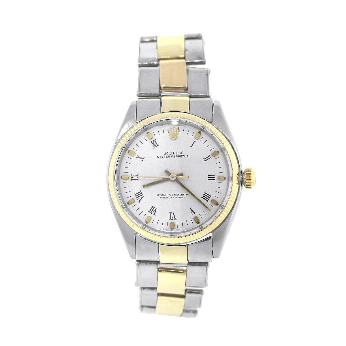 Brand: Rolex
MPN: 1005
Model: Oyster Perpetual
Case Material: Stainless Steel
Case Diameter: 36mm
Crystal: Plastic
Bezel: Fluted 18k Yellow Gold
Dial: White dial with gold hands, markers and roman numerals
Bracelet: Two tone oyster bracelet
Size: