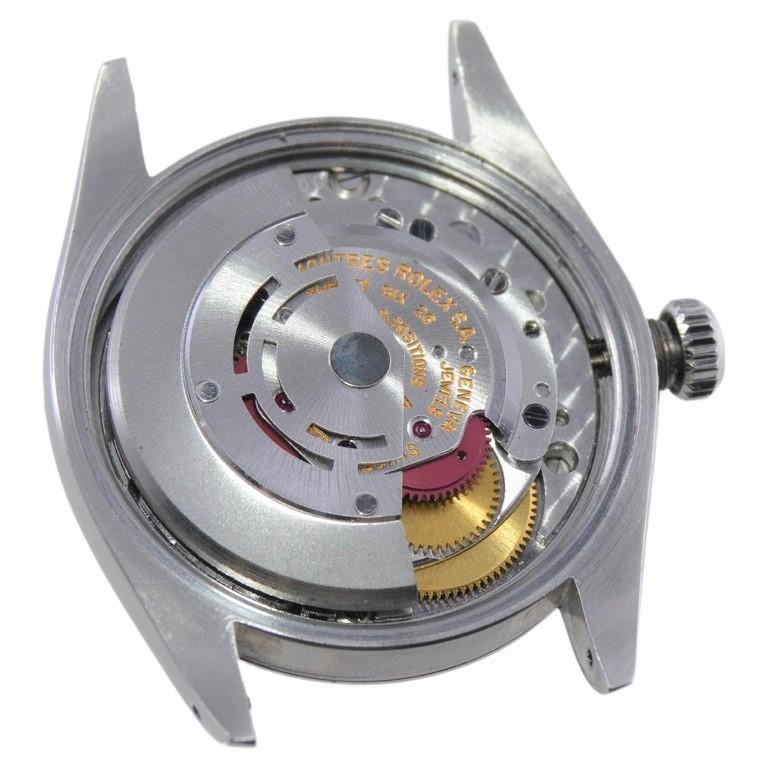 Rolex Montre Oyster Perpetual en acier inoxydable avec cadran rouge fini sur mesure, années 1960 en vente 5