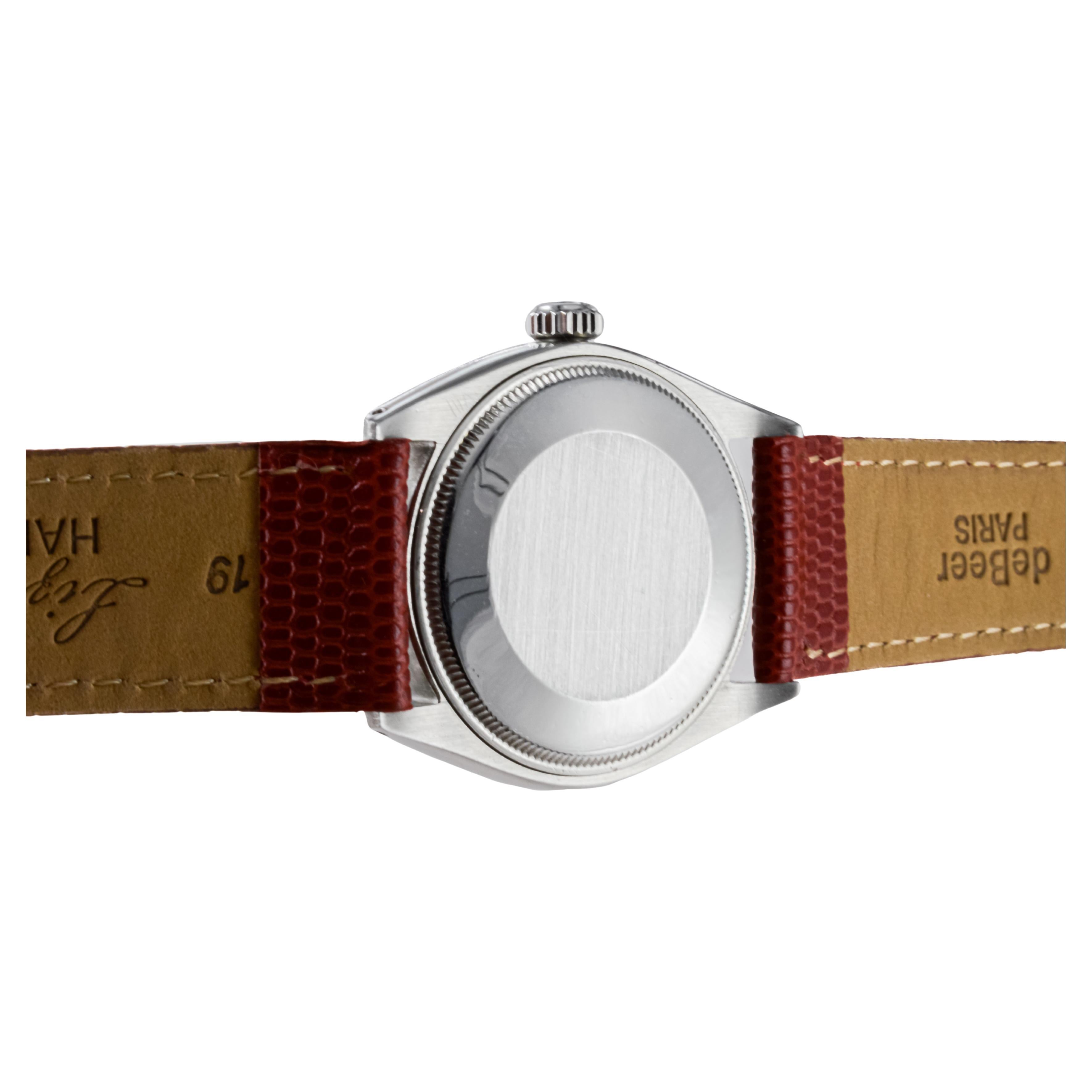 Rolex Oyster Perpetual de acero inoxidable con esfera roja personalizada hacia 1960 en venta 8