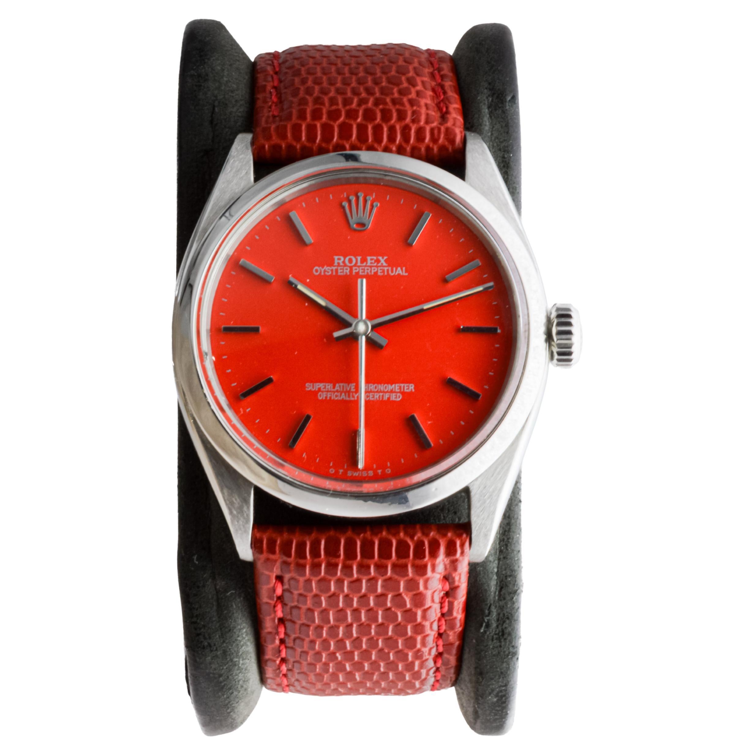 Rolex Oyster Perpetual en acier inoxydable avec cadran rouge personnalisé circa, 1960's