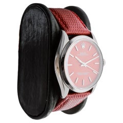 Rolex Oyster Perpetual de acero inoxidable con esfera roja personalizada circa, años 70
