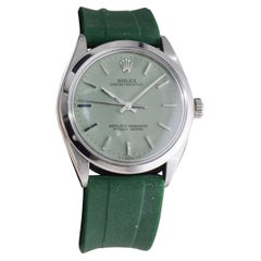 Rolex Oyster Perpetual en acier inoxydable avec cadran vert sauge personnalisé circa, 1980's