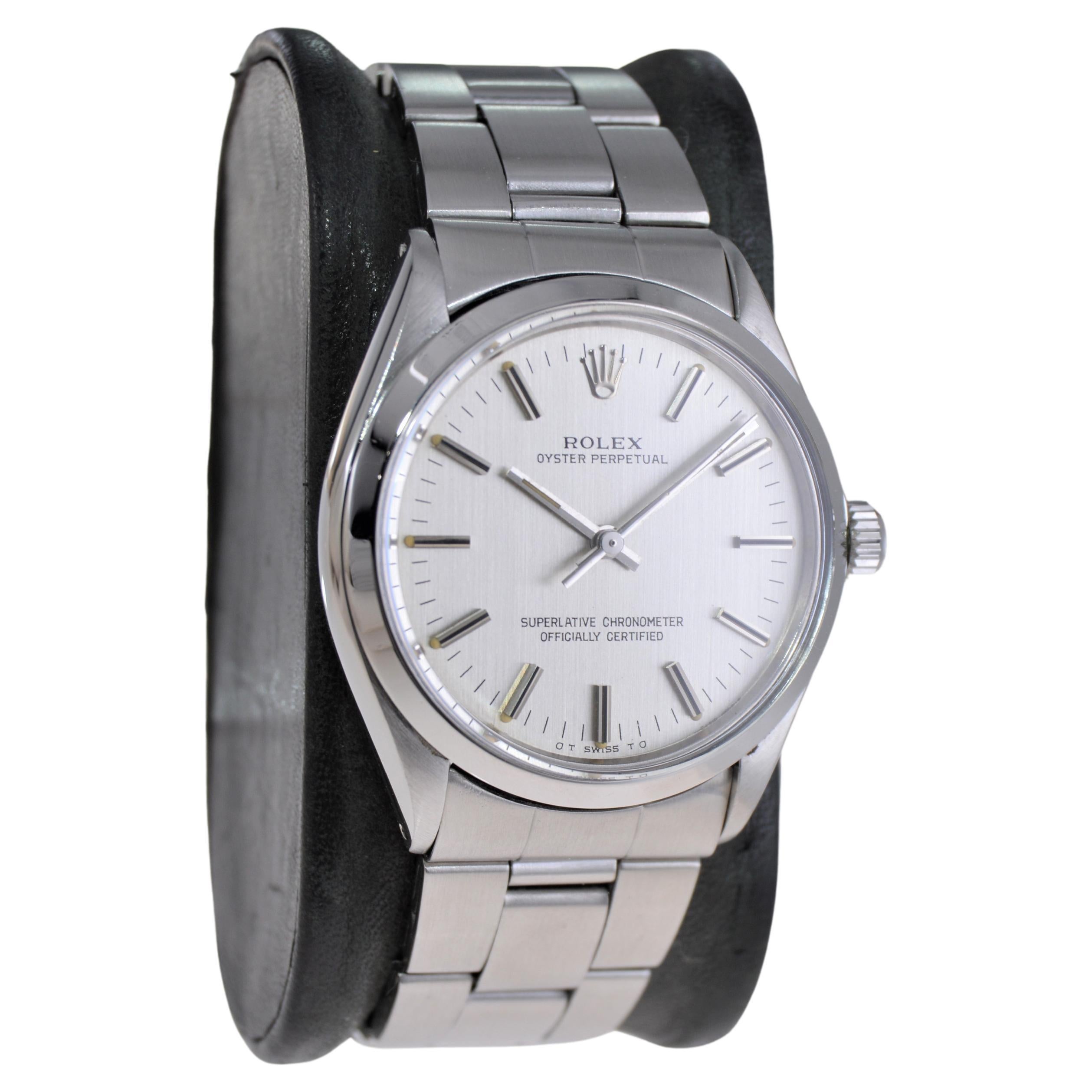 FACTORY / HOUSE: Rolex Watch Company
STYLE / REFERENCE: Oyster Perpetual Date / Reference 1002
METAL / MATERIAL: Stainless Steel
CIRCA / YEAR: 1970's
DIMENSIONS / SIZE: 39mm Length X 34mm Diameter
MOVEMENT / CALIBER: Perpetual Winding / 26 Jewels /