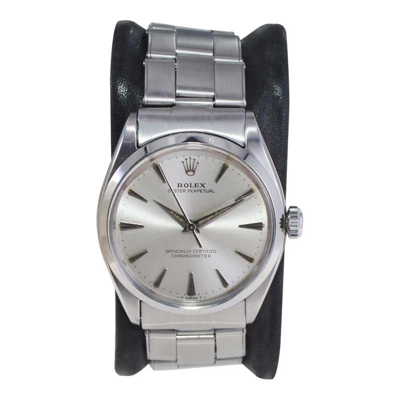 FACTORY / HOUSE: Rolex Watch Company
STYLE / REFERENCE: Oyster Perpetual / Reference 
METAL / MATERIAL: Stainless Steel
CIRCA / YEAR: 1957
DIMENSIONS / SIZE: Length 39mm X Diameter 34mm
MOVEMENT / CALIBER: Perpetual Winding / 26 Jewels / Caliber