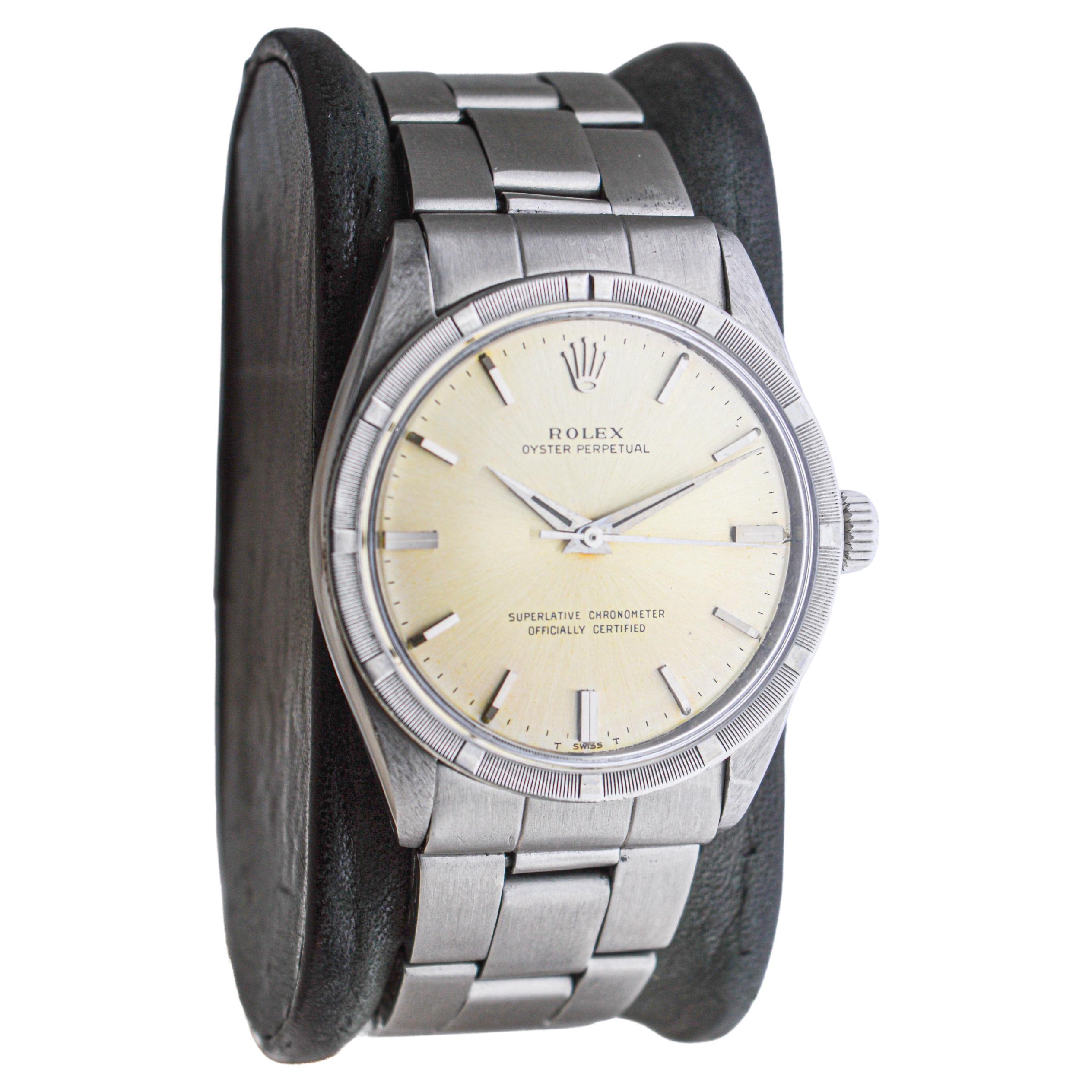 FACTORY / HOUSE: Rolex Watch Company
STYLE / REFERENCE: Oyster Perpetual / Reference 1007
METAL / MATERIAL: Stainless Steel
CIRCA / YEAR: 1964
DIMENSIONS / SIZE: Length 39mm x Diameter 34mm
MOVEMENT / CALIBER: Perpetual Winding / 26 Jewels / Caliber