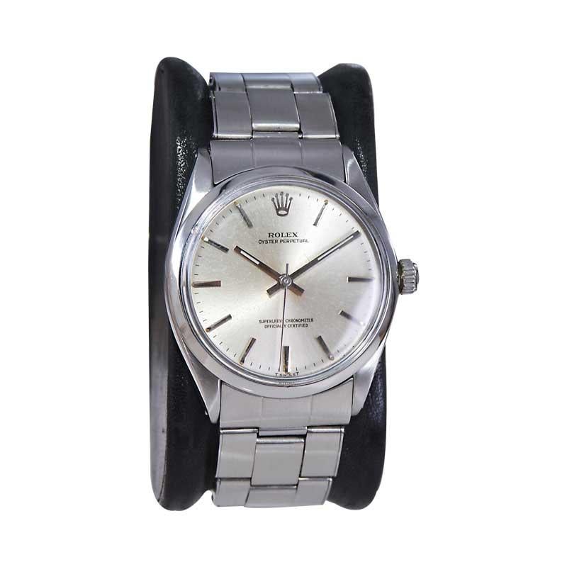 FACTORY / HOUSE: Rolex Watch Company
STYLE / REFERENCE: Oyster Perpetual / Reference 1002
METAL / MATERIAL: Stainless steel
CIRCA / YEAR: Mid 1960's
DIMENSIONS / SIZE: Length 40mm X Diameter 34mm
MOVEMENT / CALIBER: Perpetual Winding / 26 Jewels