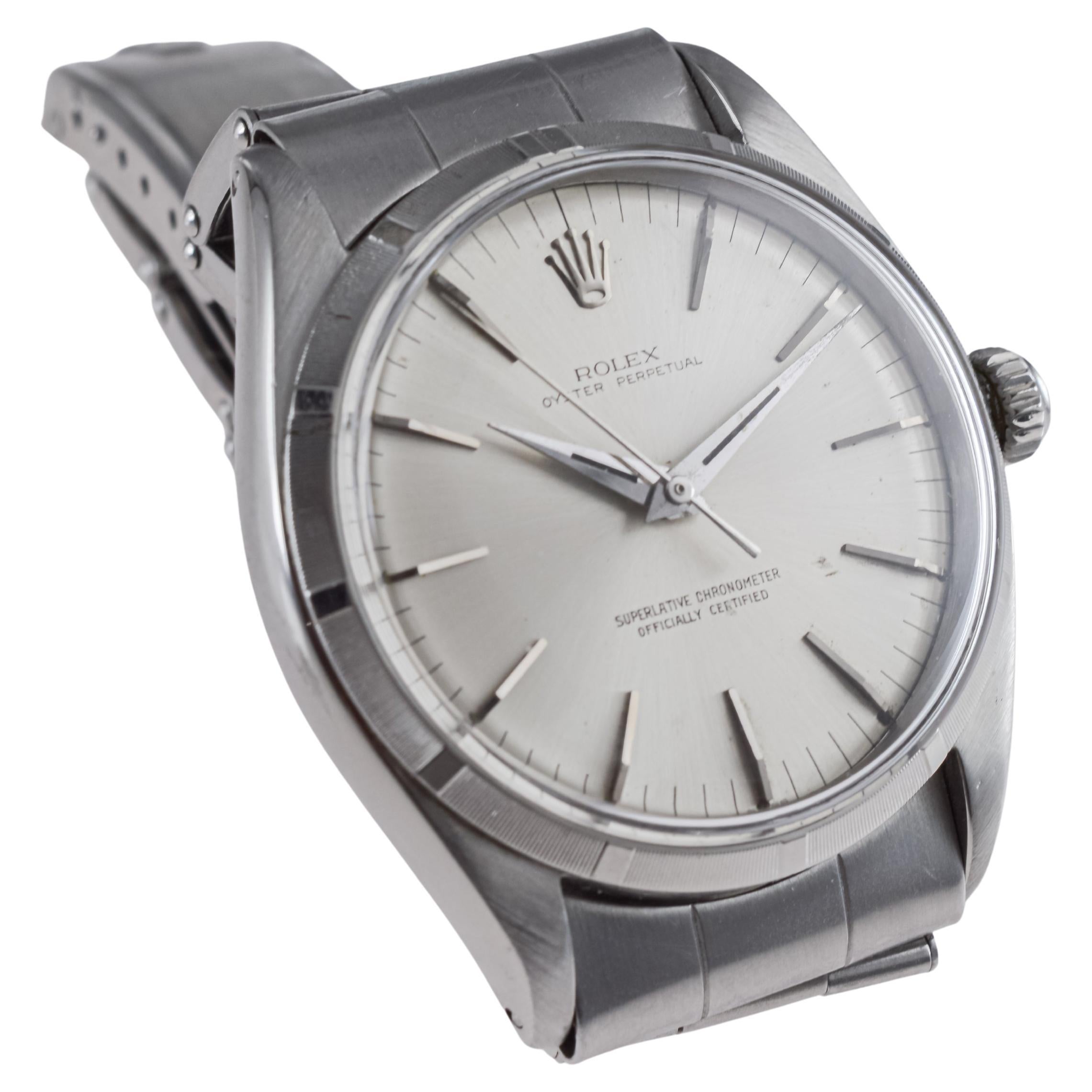Rolex Oyster Perpetual avec moteur rare et lunette tournée, 1957 en vente 4