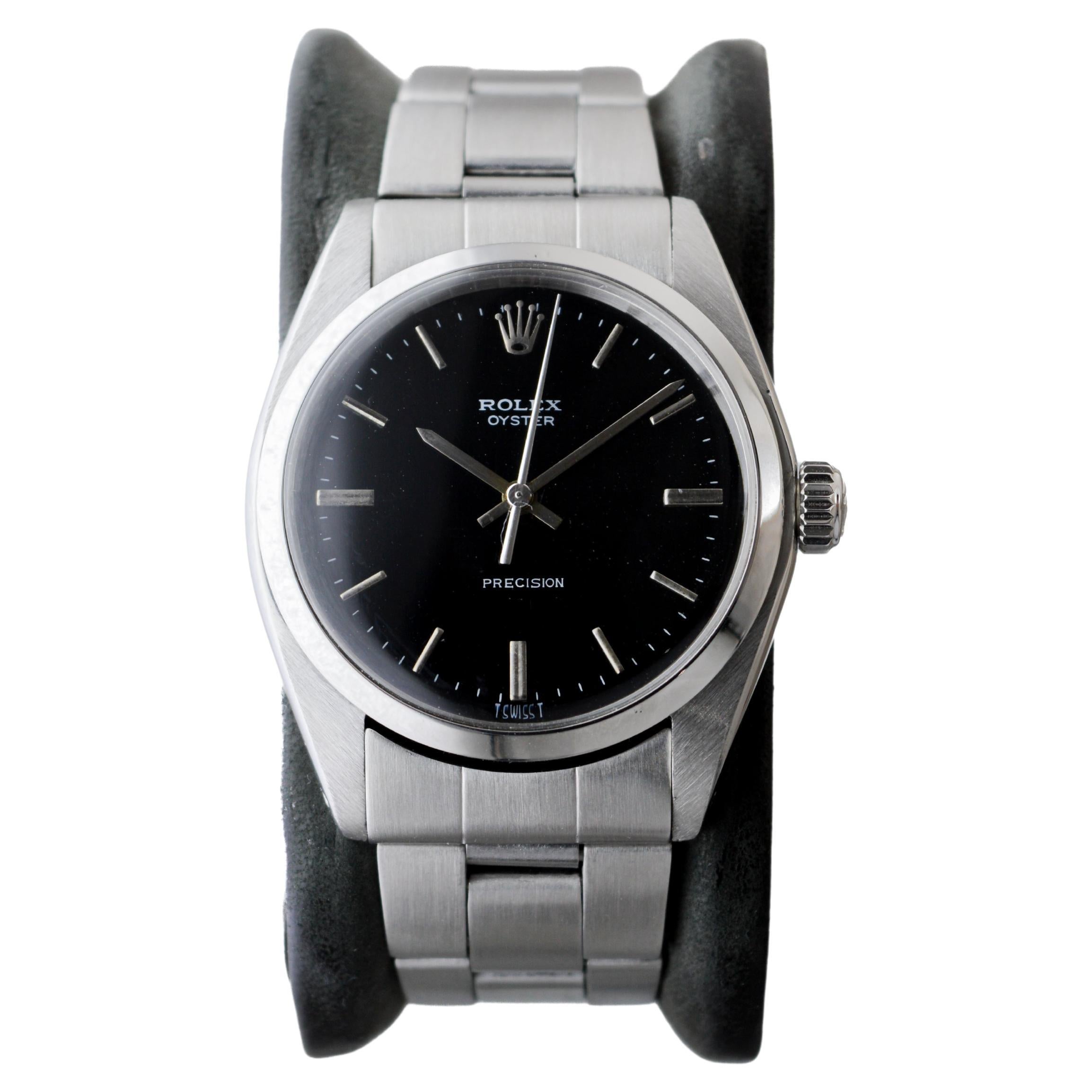 Rolex Stainless Steel Oyster with Rare Black Dial And Original Bracelet In Excellent Condition In Long Beach, CA