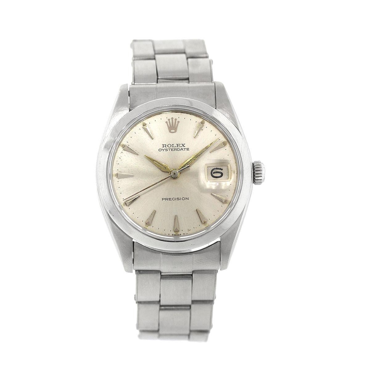 Brand: Rolex
MPN:  6694
Model:  Datejust
Case Material: Stainless Steel
Case Diameter: 36mm
Crystal: Plastic
Bezel: Smooth stainless steel bezel
Dial: Silvered dial with date window at the 3 o’clock position
Bracelet: Brushed stainless steel Oyster