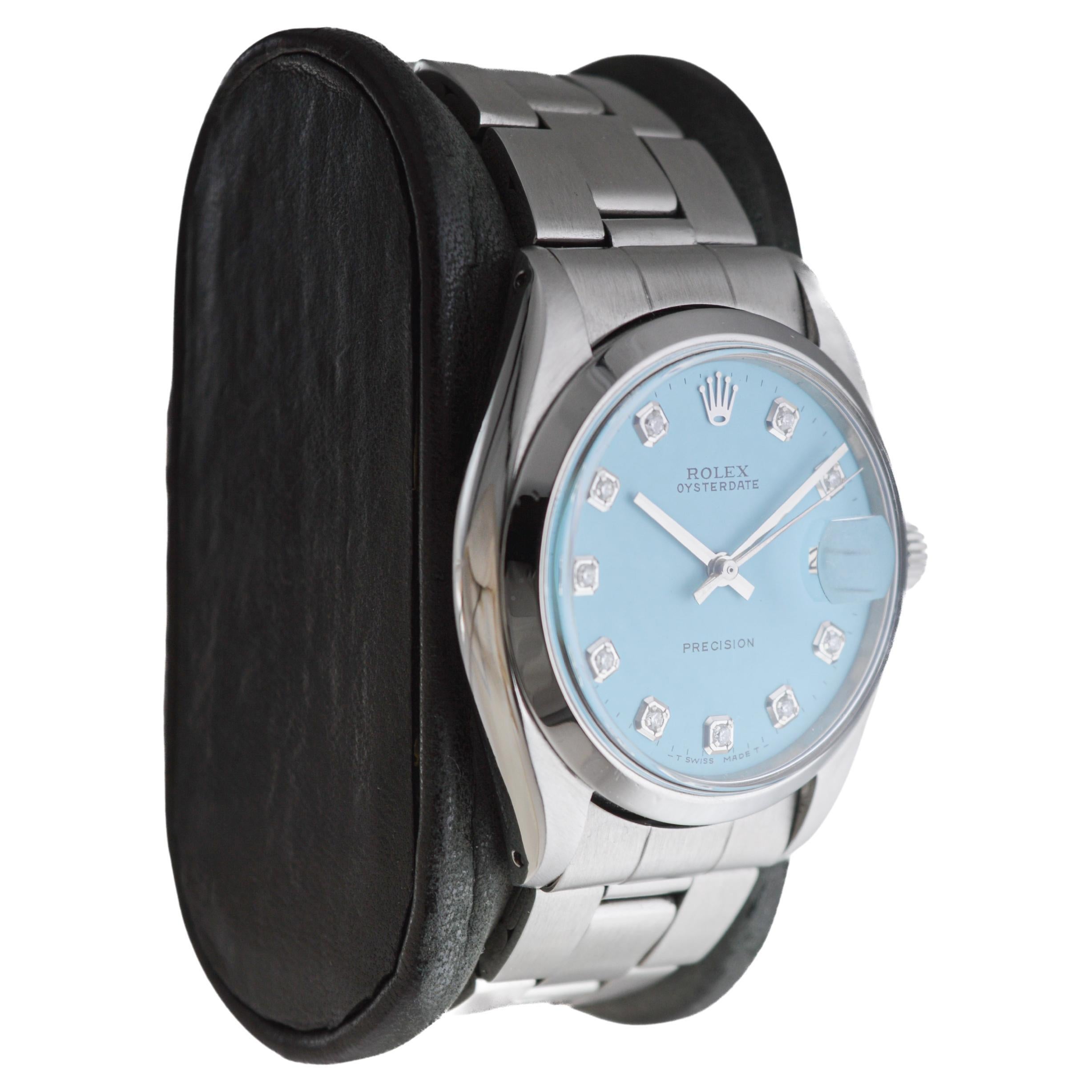 FACTORY / HOUSE: Rolex Watch Company
STYLE / REFERENCE: Oysterdate / Reference 6694
METAL / MATERIAL: Stainless Steel
CIRCA / YEAR: 1960's
DIMENSIONS / SIZE: Length 42mm X Diameter 35mm
MOVEMENT / CALIBER: Manual Winding / 17 Jewels 
DIAL / HANDS: