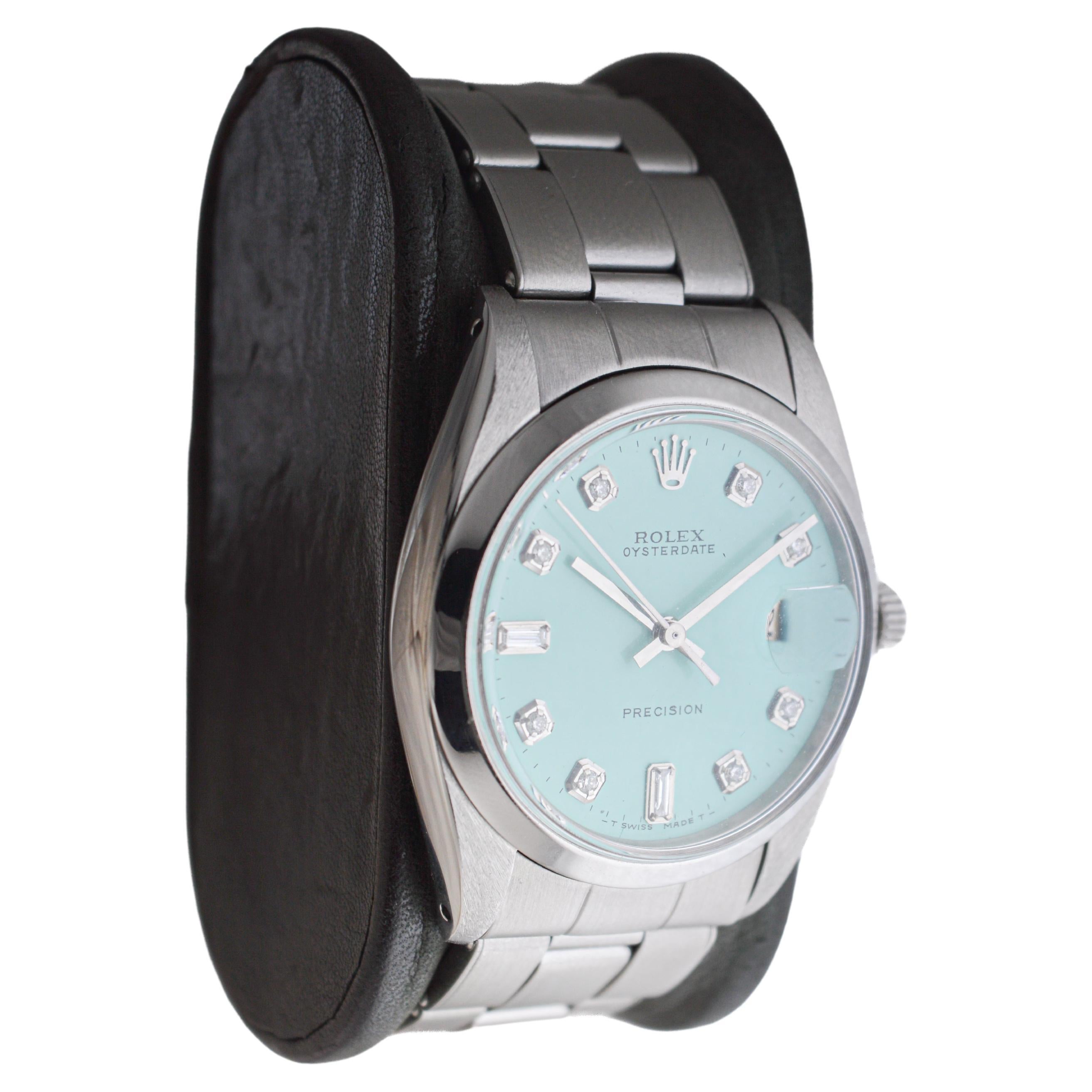 FACTORY / HOUSE: Rolex Watch Company
STYLE / REFERENCE: Oysterdate / Reference 6694
METAL / MATERIAL: Stainless Steel
CIRCA / YEAR: 1960's
DIMENSIONS / SIZE: Length 42mm X Diameter 35mm
MOVEMENT / CALIBER: Manual Winding / 17 Jewels 
DIAL / HANDS:
